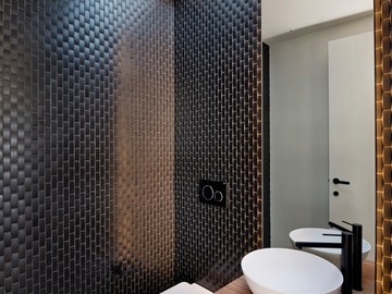 Renting out with online payment: Architectural Powder room with Black Tiling