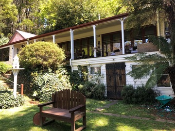 Renting out with online payment: Entire 21 acre property, permanent creek, former guest house 