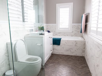 Renting out with online payment: White Bathroom with Feature Tiles