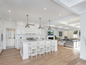Renting out with online payment: Modern White Open Plan Kitchen with Island Bar