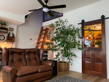 Renting out with online payment: Vintage Inspired Studio with Wood Paneled Walls and Ceilings