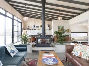 Renting out with online payment: Lounge Area with Large Windows and Fireplace