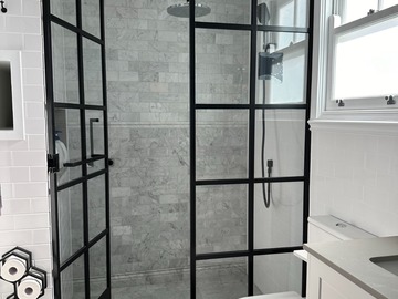 Renting out with online payment: Master bathroom with double vanity and carrara feature wall