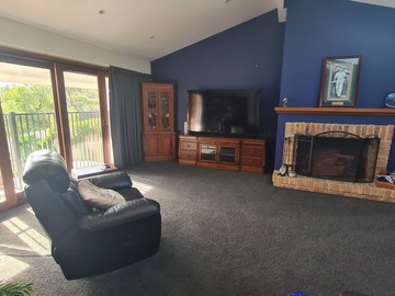 Renting out with online payment: Lounge Area with Fireplace
